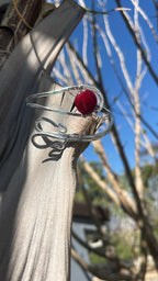 Arm bracelet with red stone